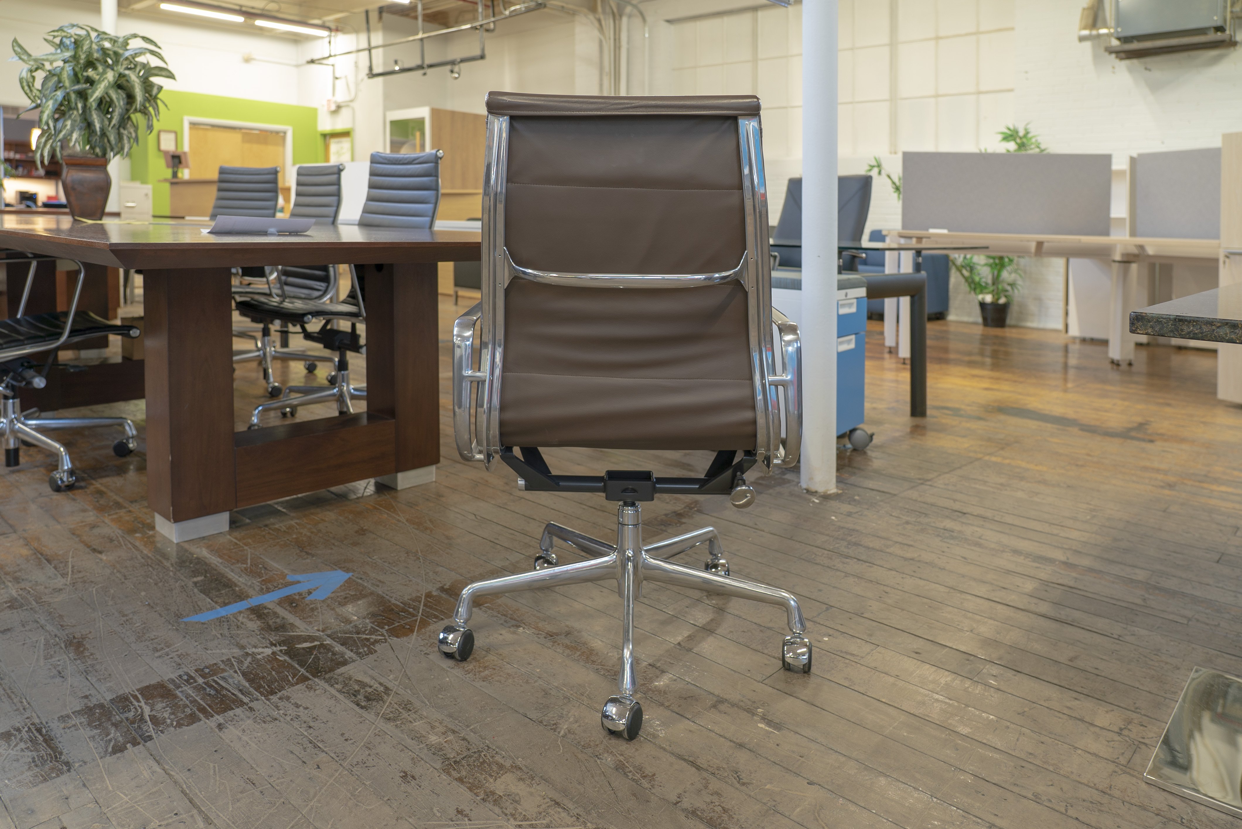 herman-miller-eames-soft-pad-brown-leather-executive-chairs